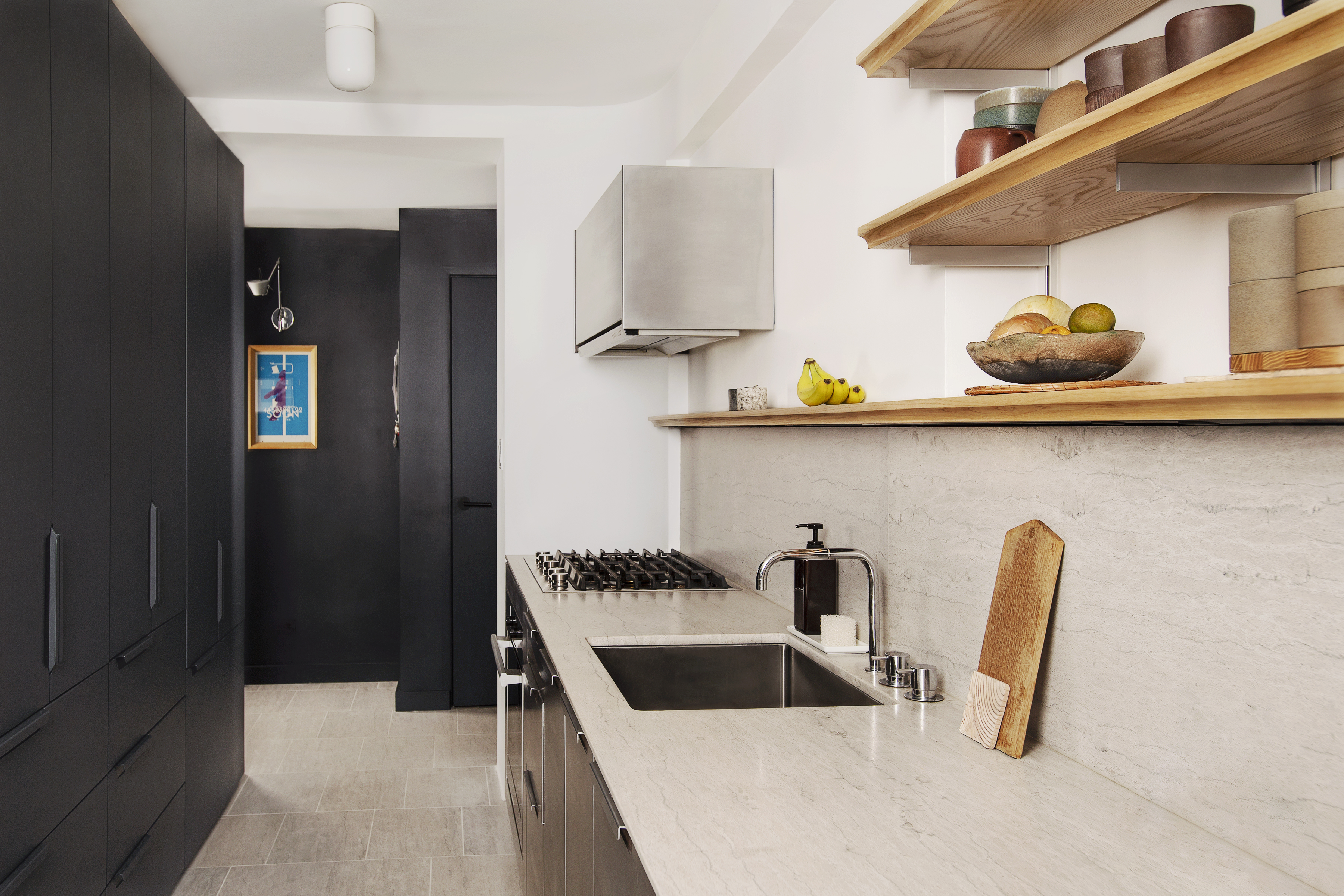 A Modern Limestone Kitchen With Long Linear Veins And A Thin Edge