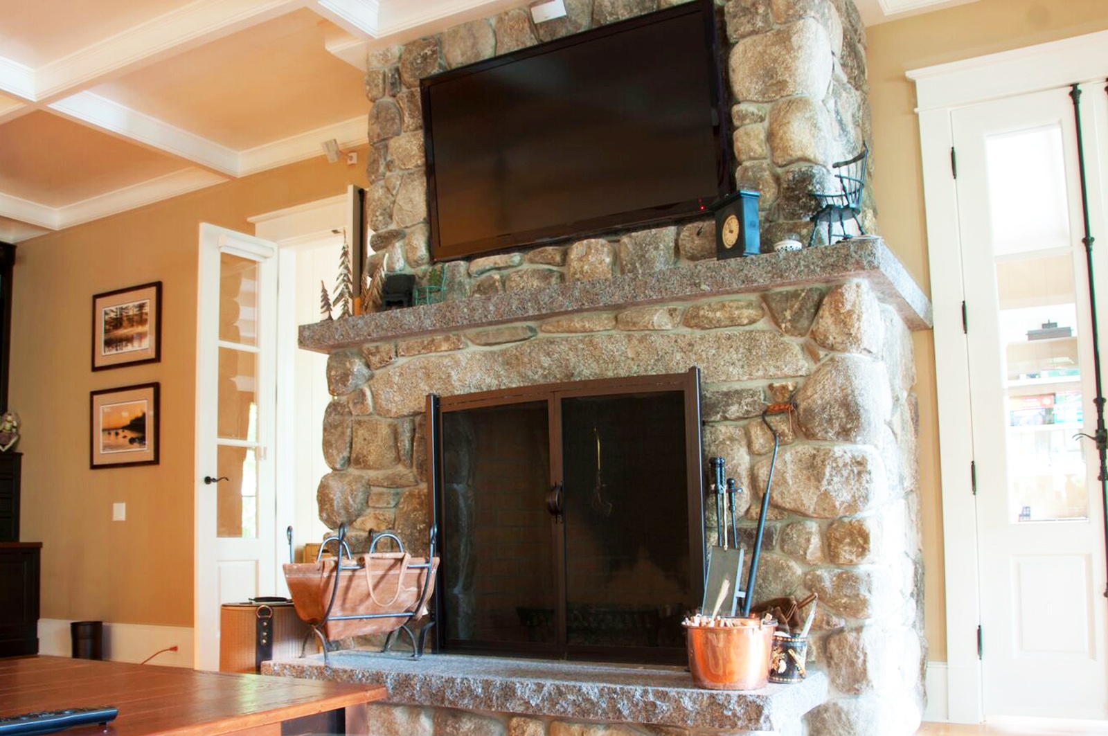 Natural stone fireplace Caledonia granite hearth and mantel