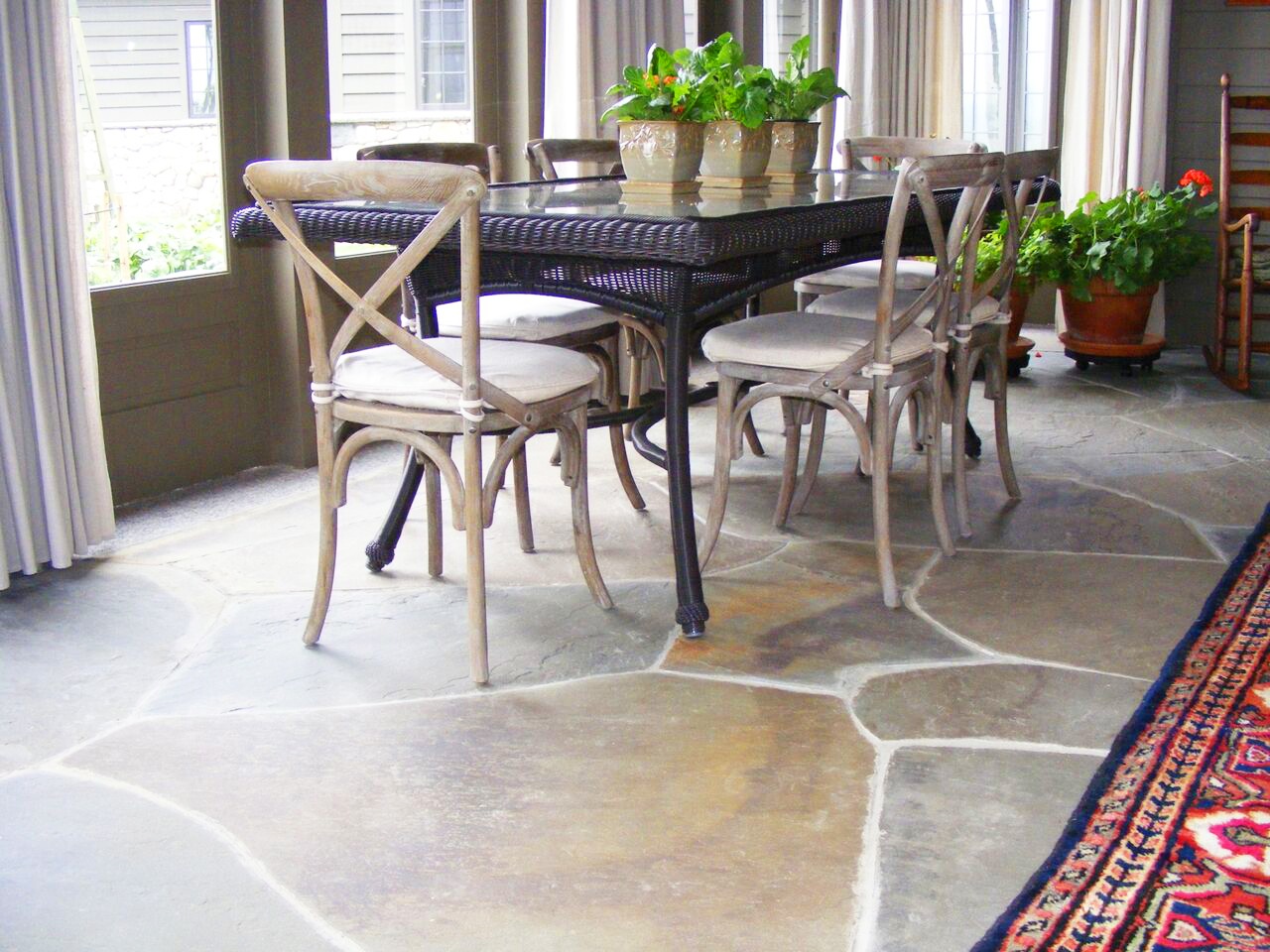 Irregular bluestone pavers dining room flooring